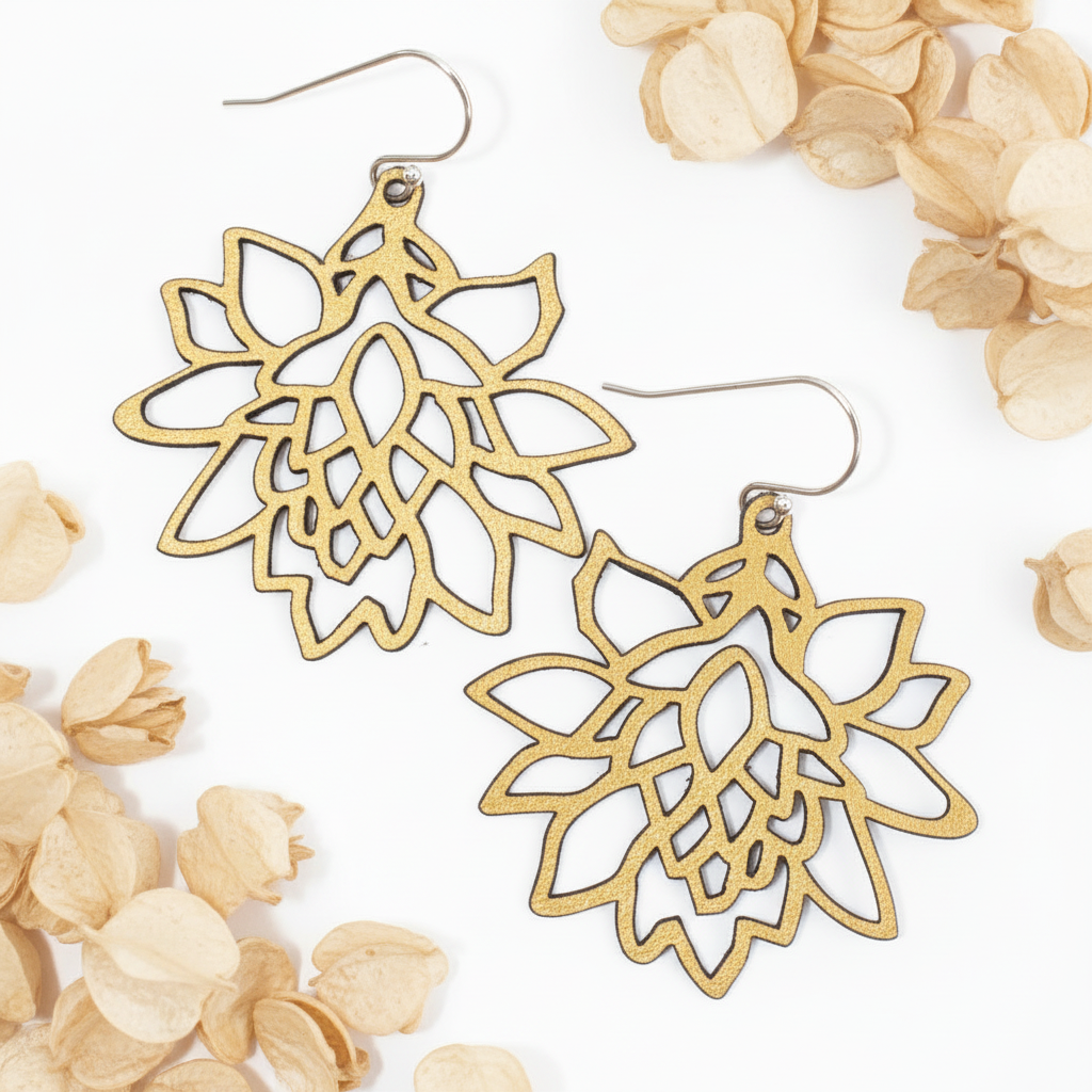 Metallic gold flower earrings with beige petals
