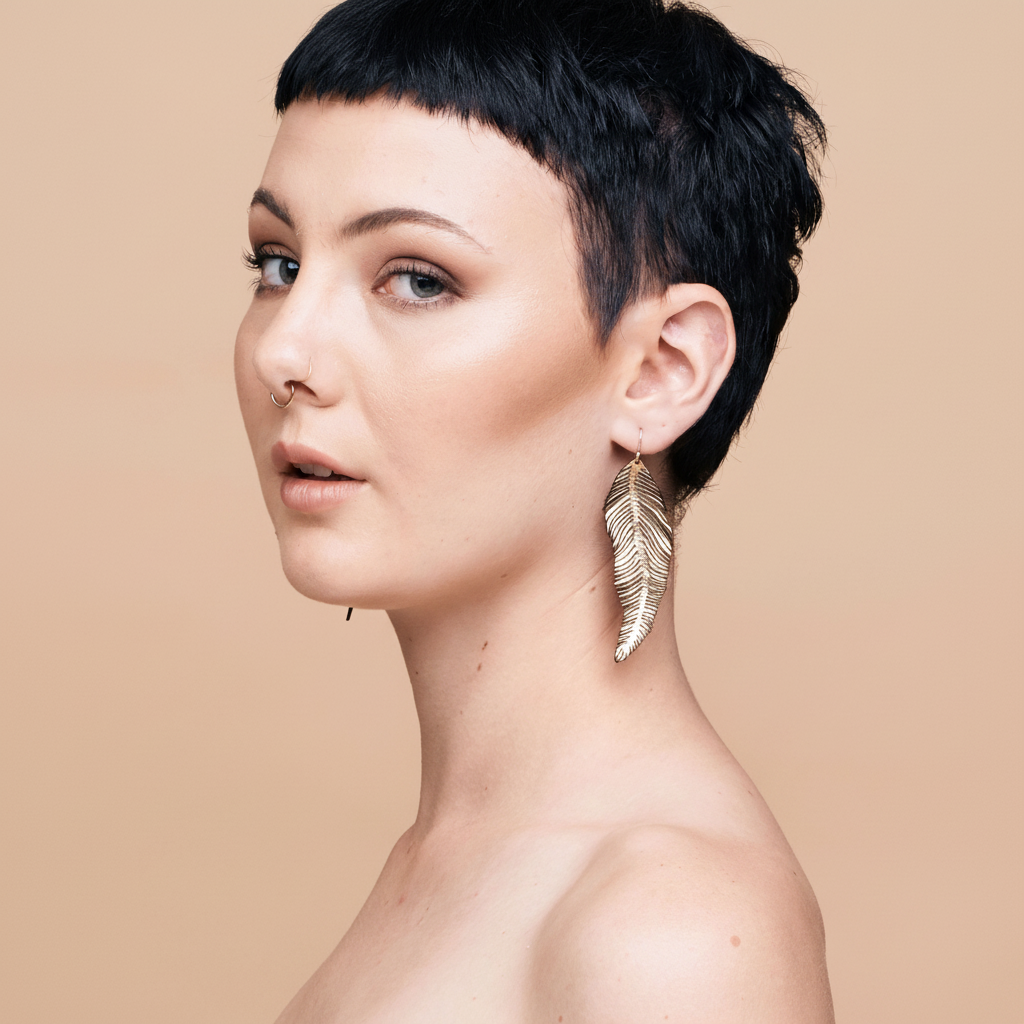 Model wearing feather earrings - square format