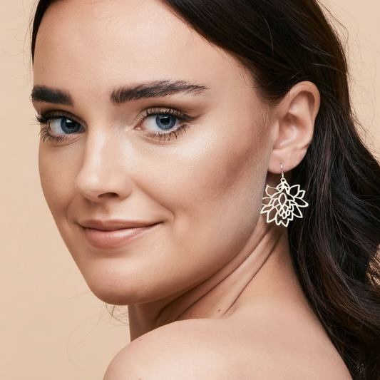 Model wearing white lotus earring